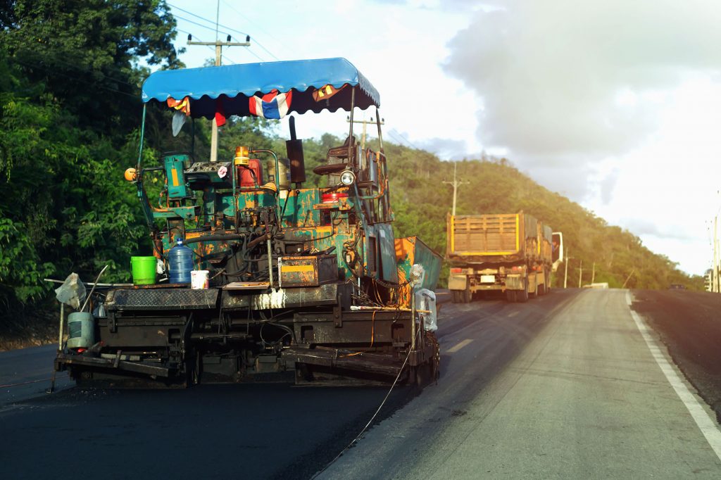 Road construction machinery Workers driving road maintenance vehicles